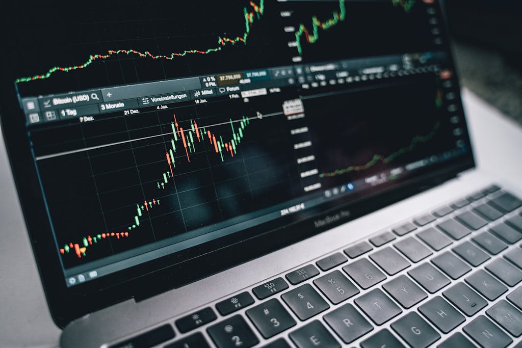 Close-up of a financial graph on a laptop screen, depicting stock market analysis in Berlin.